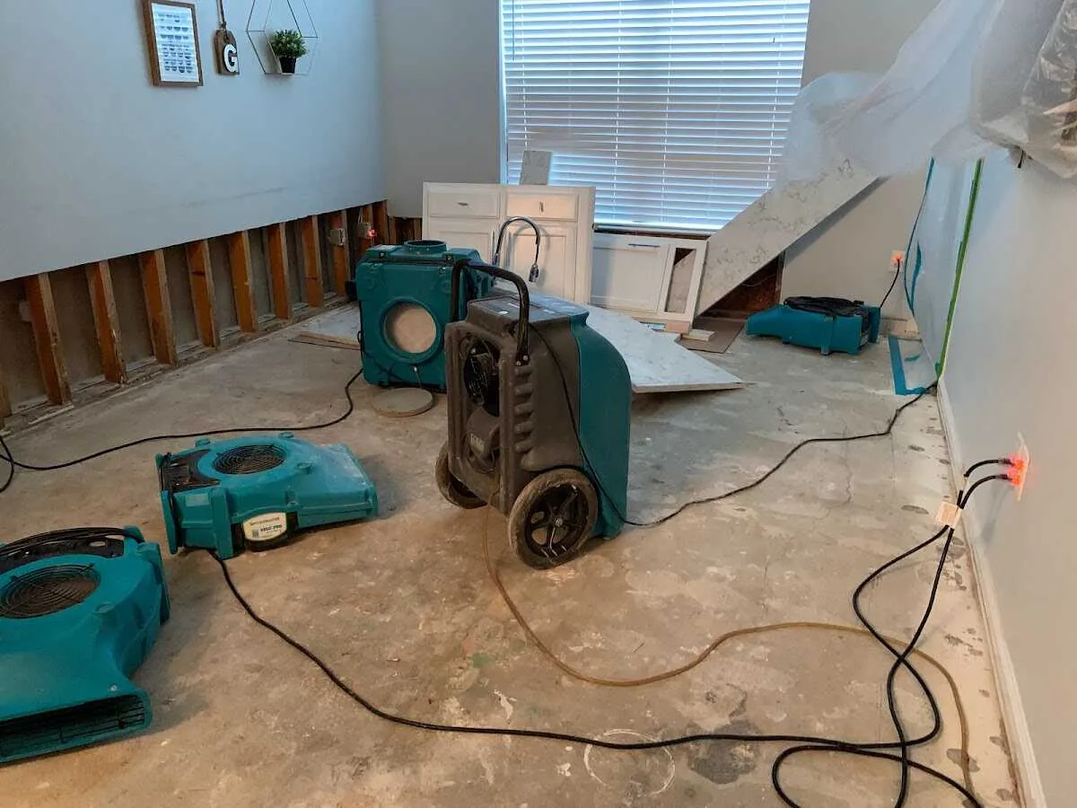 Dehumidifier in flood-cut room for Water Damage Restoration in East Buffalo